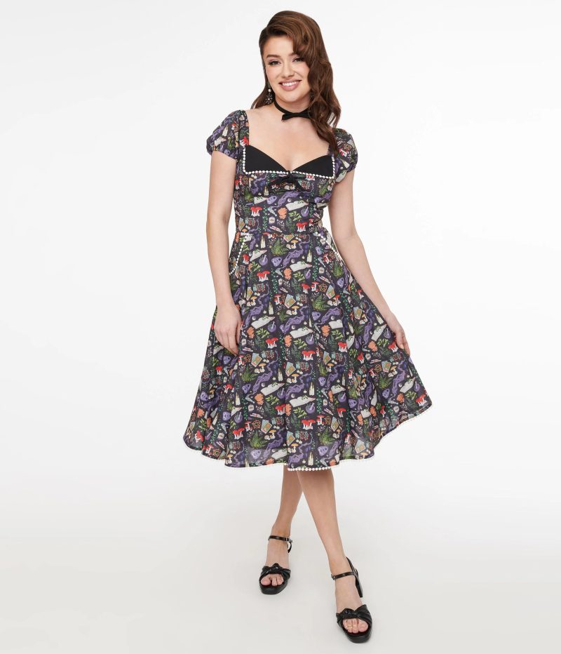 UniqueVintage1950sBlackSpellbindingPrintSwingDress